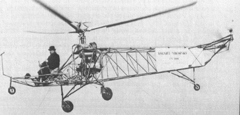 Igor Sikorsky at the controls of the original VS-300. This model had two tail-rotors. One providing anti-torque and steering, the other tail-rotor was mounted horizontally to help with fore and aft stability.